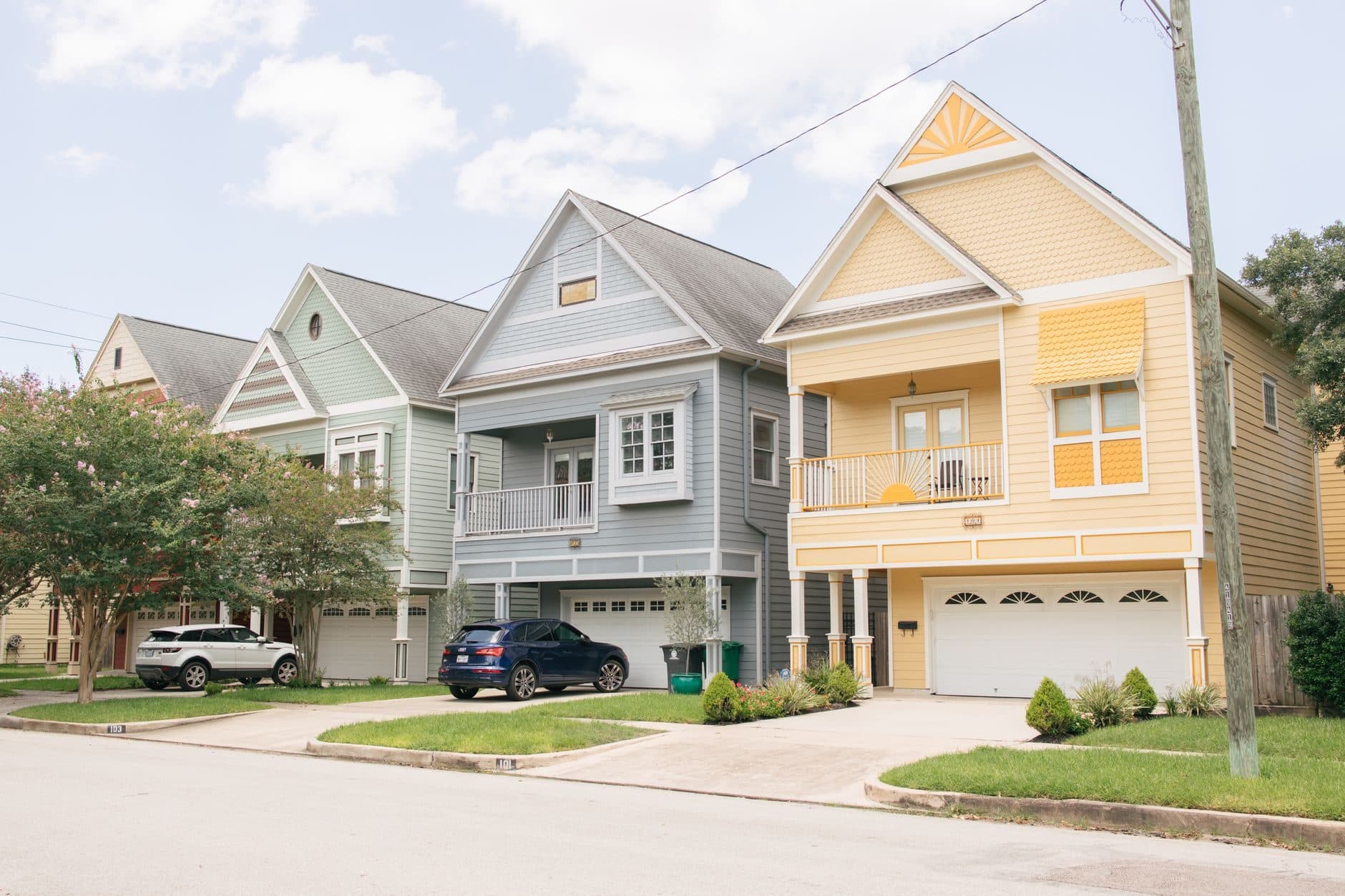 Neighbouring two-story houses side by side on a residential street